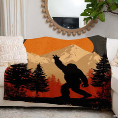 Full flat lay of the Bigfoot peace sign mountain sunset blanket.