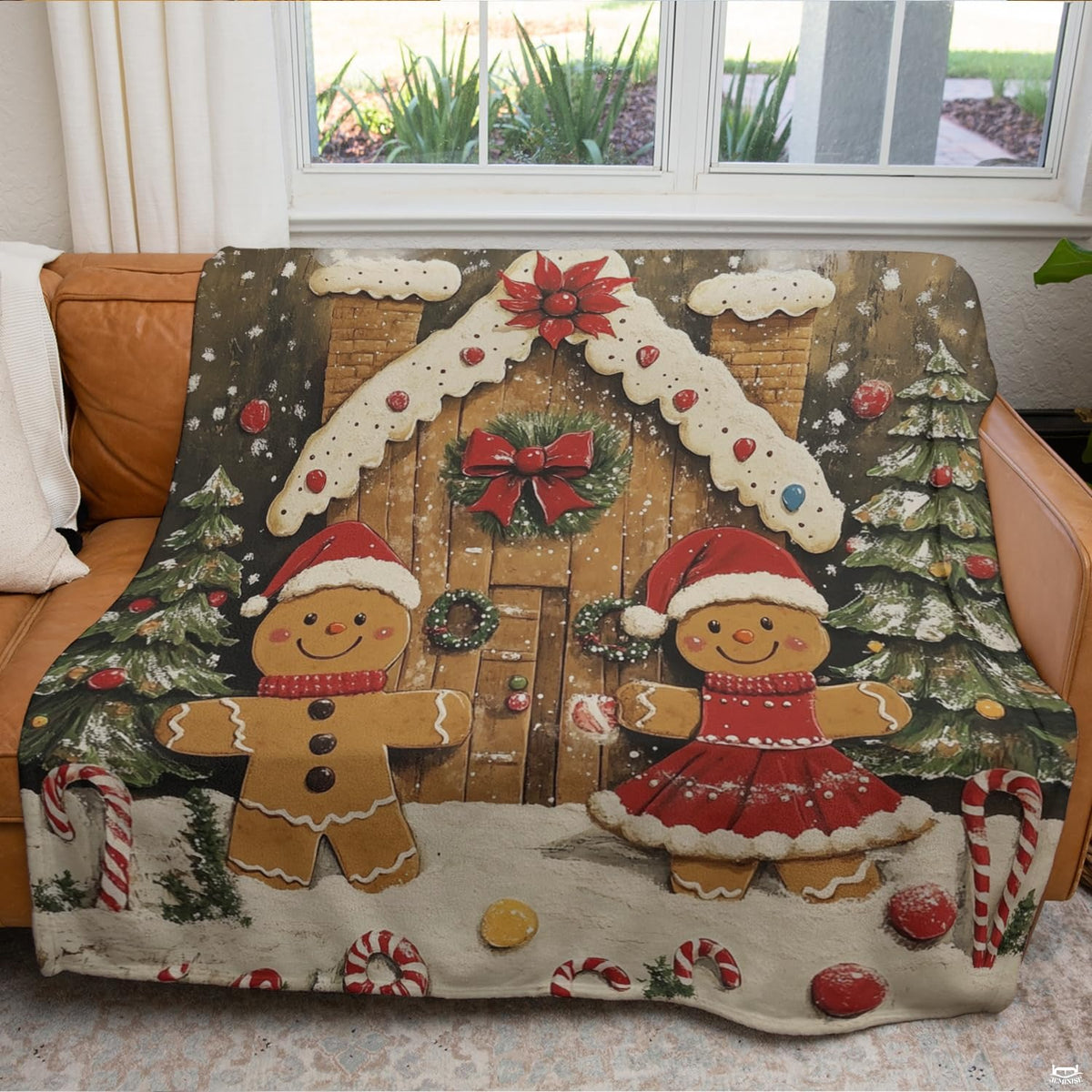 Smiling gingerbread couple in Santa hats before snowy cottage, view 4.