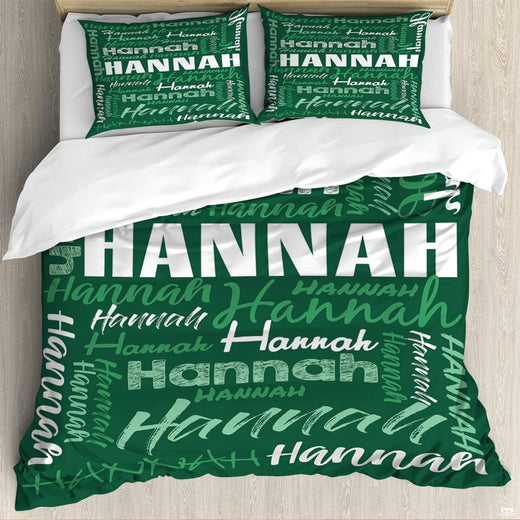 Forest green typography bedding featuring an interlocking word collage in block and script fonts on green backdrop
