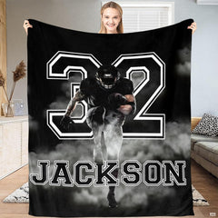 Close-up of athletic jersey numbering and smoky stadium effects in football bedroom decor boy styling.