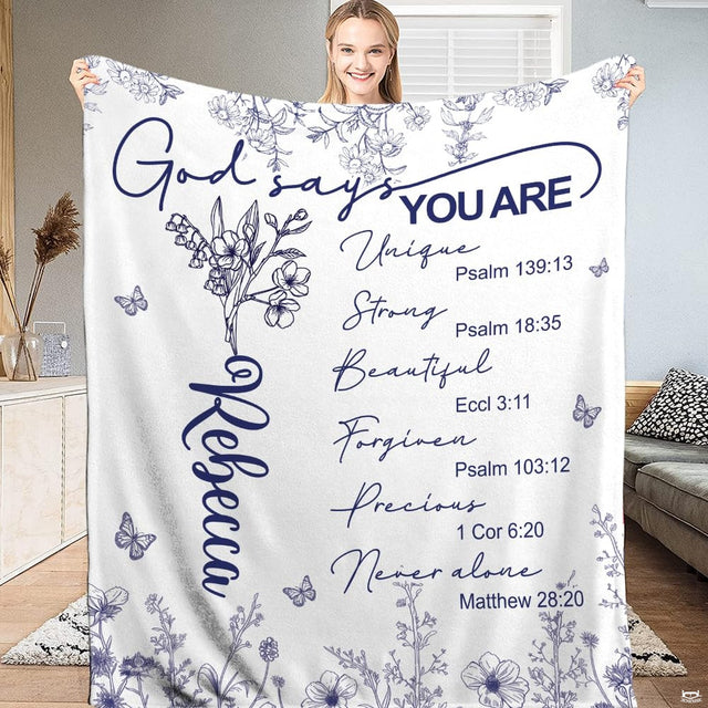 Scripture blanket featuring navy botanical wildflower sketches and verse typography on white.
