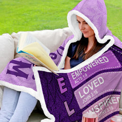 Peaceful bedroom setting featuring purple scripture hooded blanket