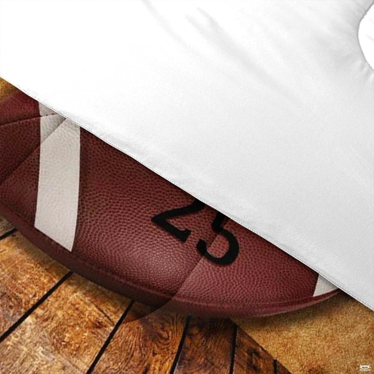 Angle view of athletic bedding illustrating platinum silver and bronze footballer graphic textures
