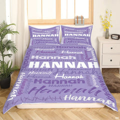 Lilac and violet word art bedding display complemented by contemporary bedroom furnishings.