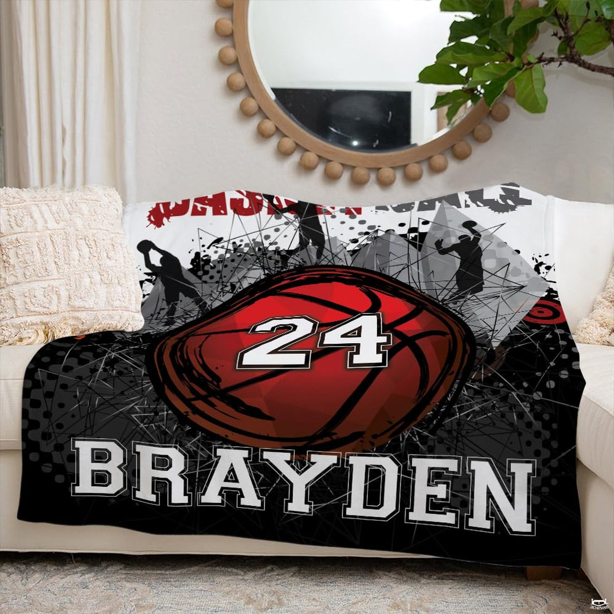 Athletic basketball print bedding layered neatly against modern minimalist bedroom decor.