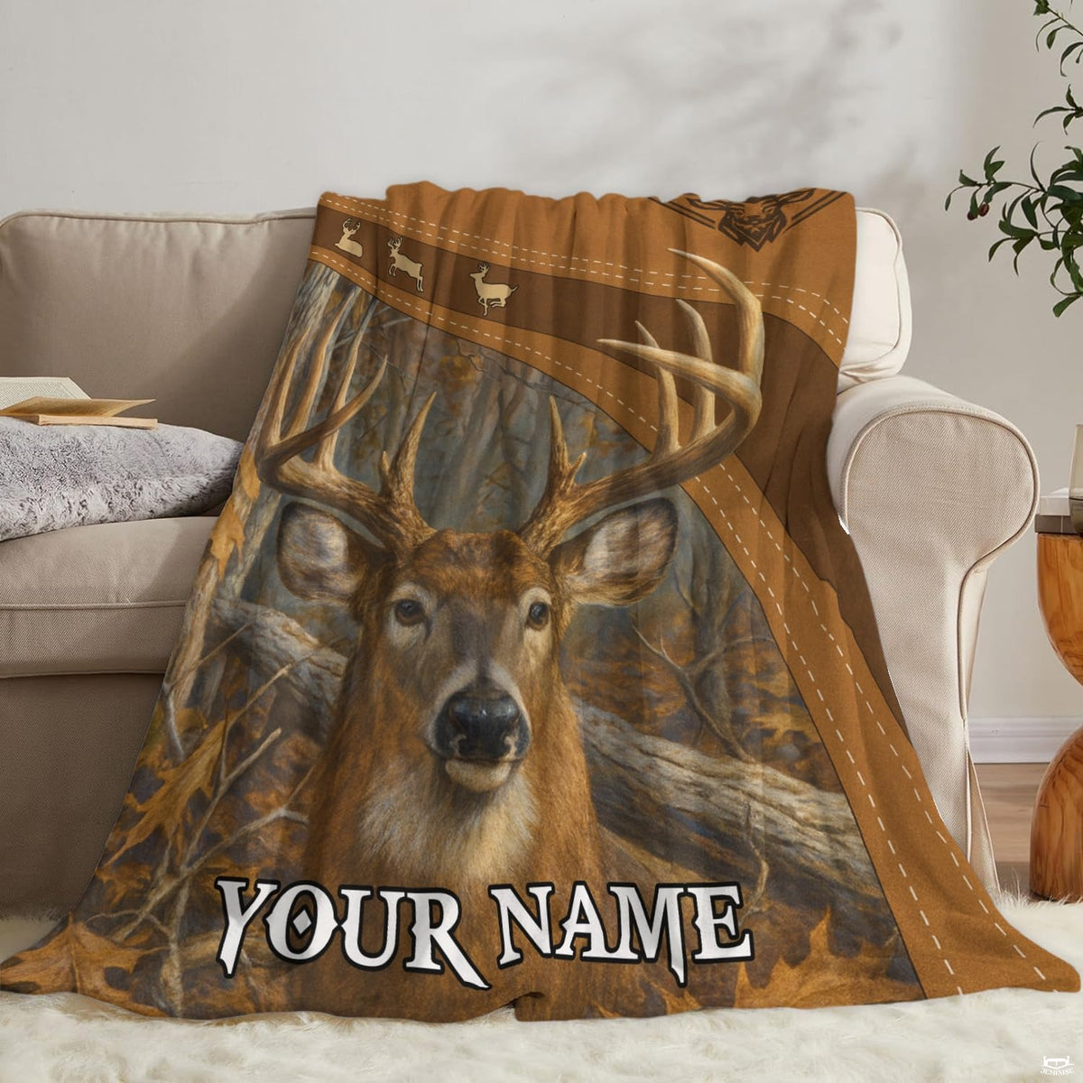 Lifestyle display of the whitetail deer blanket in a cabin interior.