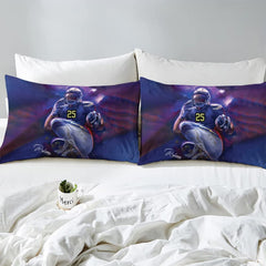 Matching pillow sham detail for football bedding set displaying leaping athlete graphics in bedroom setting