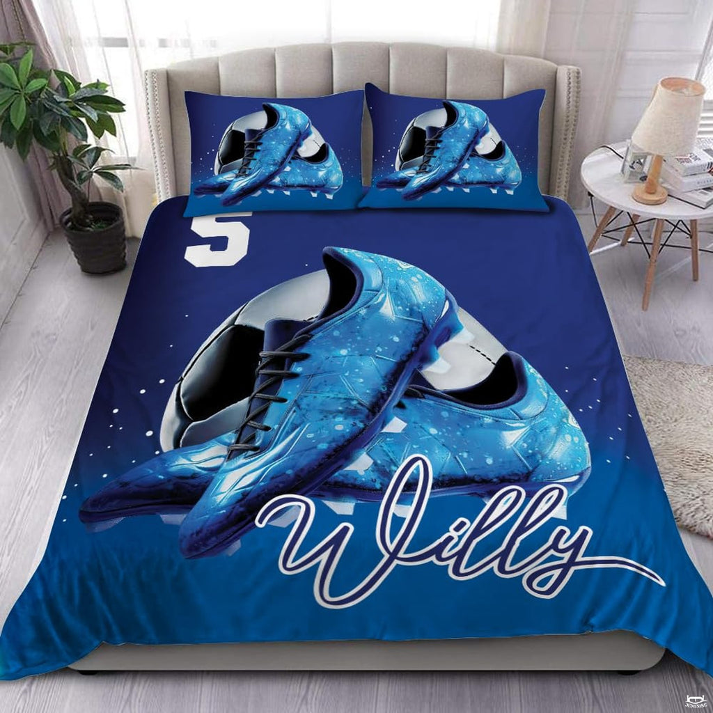 Blue soccer cleats sports bedding featuring athletic soccer footwear and a soccer ball graphic on a bed