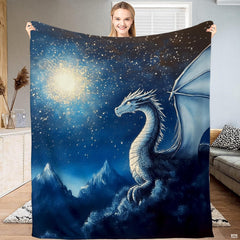 Majestic ice dragon atop snowy mountain peaks under a celestial night sky with glowing golden starburst.