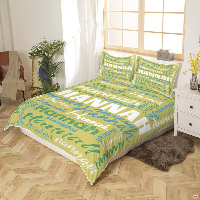 Yellow and green typography bedding displaying vibrant word collage artwork in bedroom setting