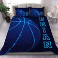 Glowing blue dot basketball bedding featuring stippled basketball artwork and electric contour curves on navy