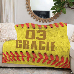 Bedroom interior display showing macro softball throw blanket styled on modern accent seating