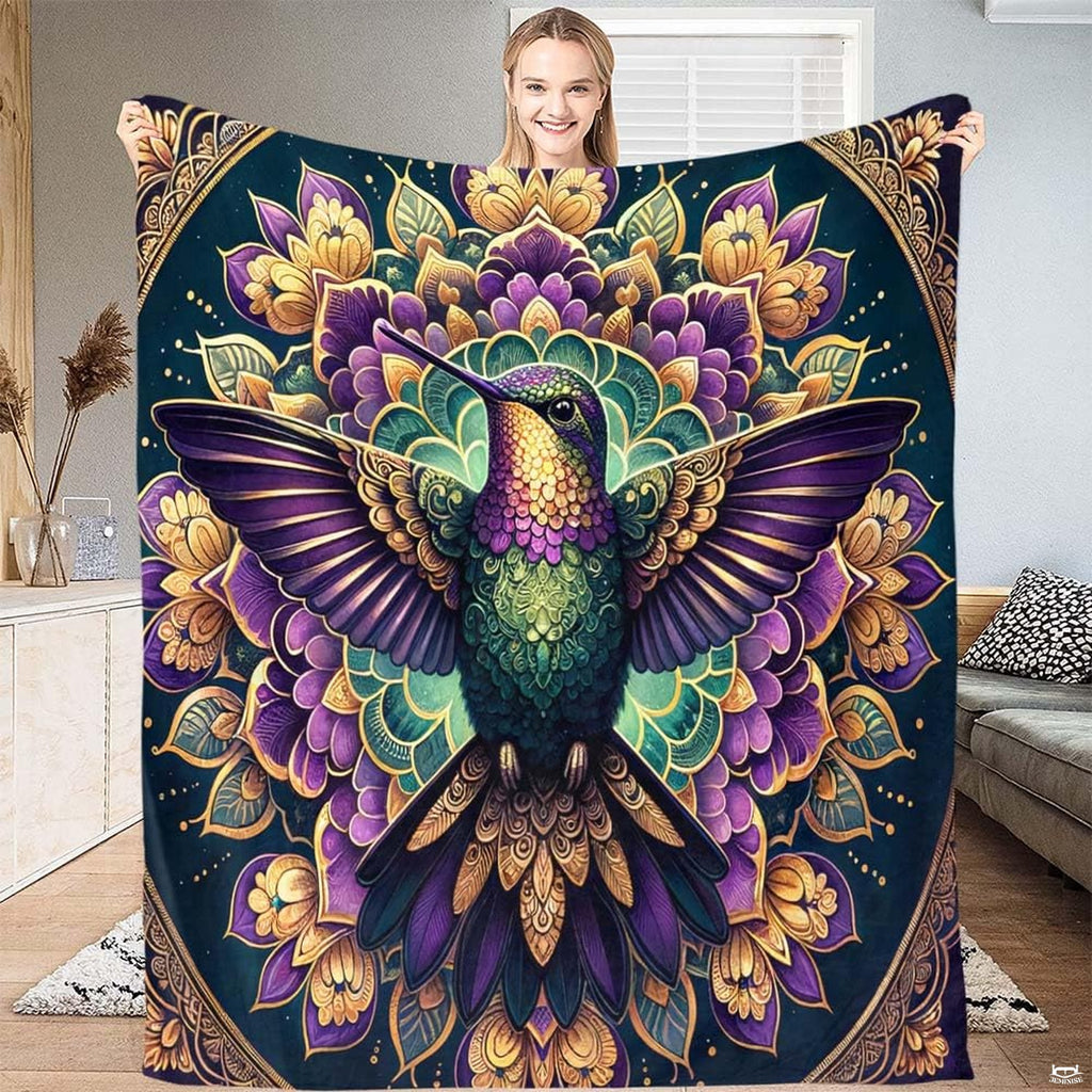 Hummingbird mandala blanket featuring an iridescent hummingbird centered on an ornate floral medallion.