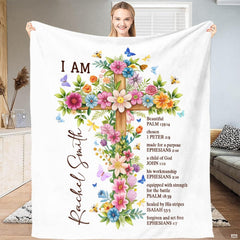 Christian floral cross faith blanket featuring wooden cross adorned with garden flowers and butterflies.