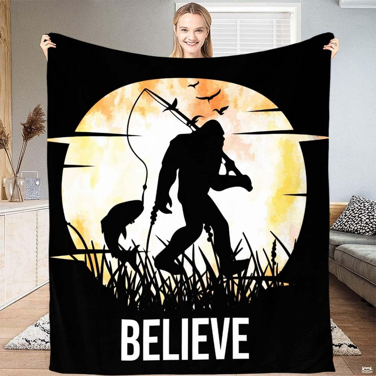 Fishing Bigfoot moon silhouette throw blanket featuring Sasquatch with fishing rod before glowing harvest moon