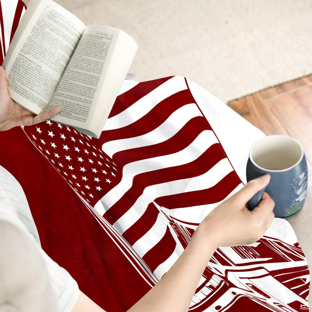 Detailed perspective of the waving American flag and heraldic Maltese cross badge on the throw blanket