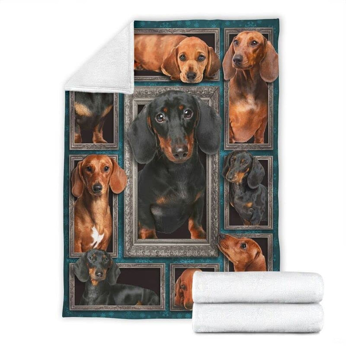 Folded corner and rolled layout of the Dachshund blanket showing the white reverse side.