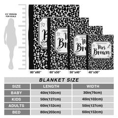 Overhead layout of black white marbled notebook themed bedding set with illustrated details.