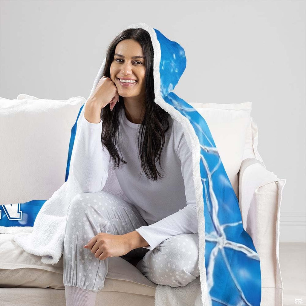 Detailed view of athletic block lettering and water splash droplets on soccer blanket