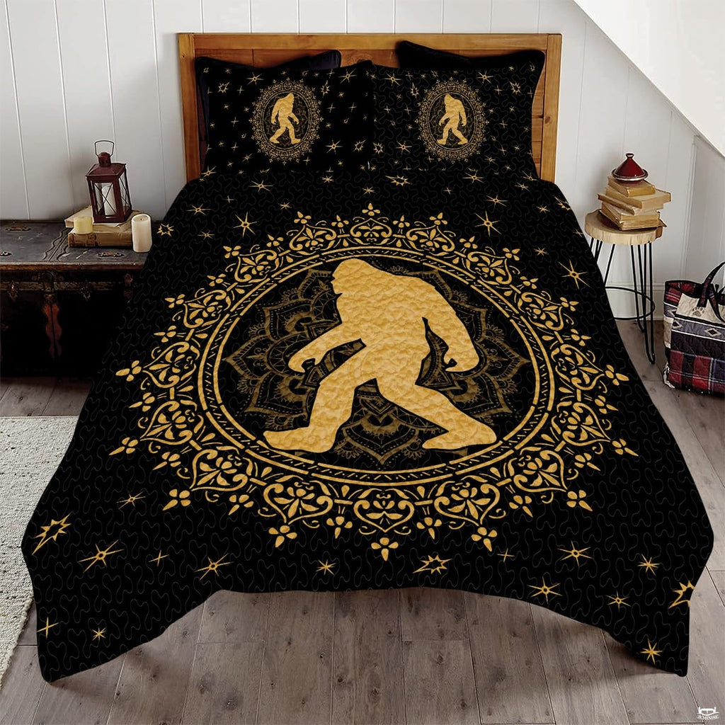 Golden moonlit Bigfoot Sasquatch woodland bedding set displayed on a bed in a rustic mountain lodge