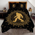 Golden moonlit Bigfoot Sasquatch woodland bedding set displayed on a bed in a rustic mountain lodge