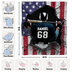 Bold baseball batter graphic showing through a cracked opening on athletic themed bedding.