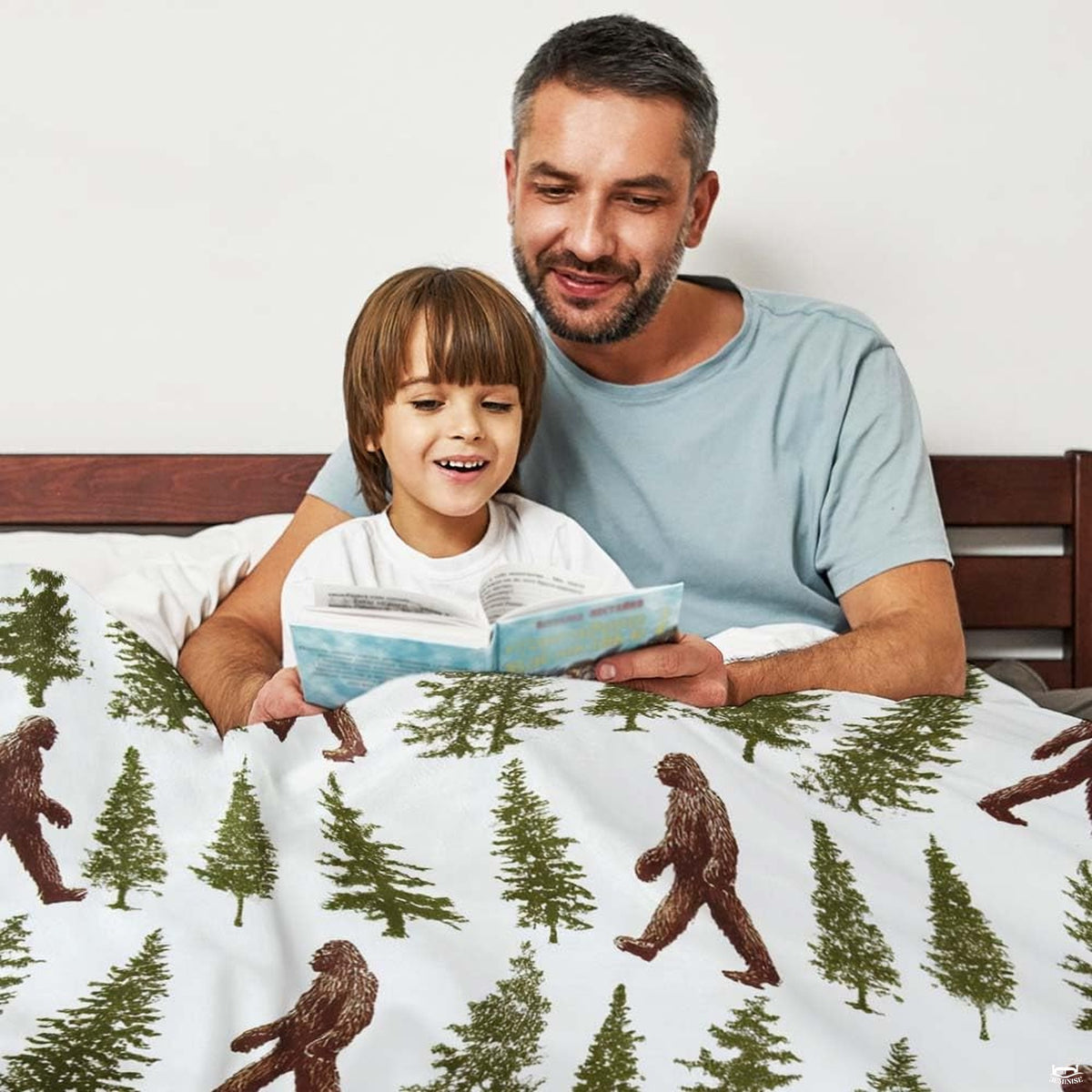 Sasquatch bed sheets design with wandering Bigfoot silhouettes among vintage mountain pines.