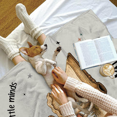 Detailed view of vintage floral bed sheets pattern with wildflowers sprouting from sepia book pages.