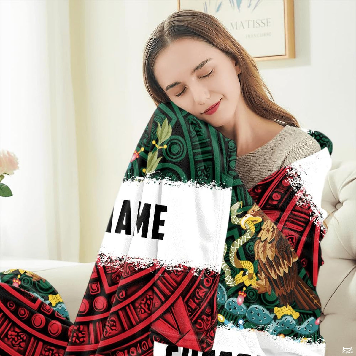 Mexican national emblem throw blanket displayed as a decorative accent on a couch