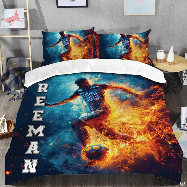 Close-up view of soccer bedding highlighting contrasting golden fire flames and icy cyan plasma plumes