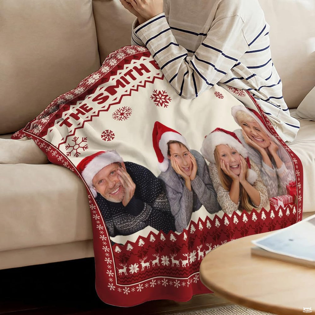 Close view of Fair Isle reindeer border and red snowflakes on blanket