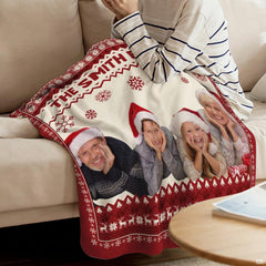 Close view of Fair Isle reindeer border and red snowflakes on blanket