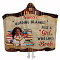 Book lover throw blanket featuring an illustrated reader with book stacks and library shelves