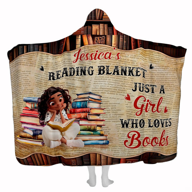Book lover throw blanket featuring an illustrated reader with book stacks and library shelves