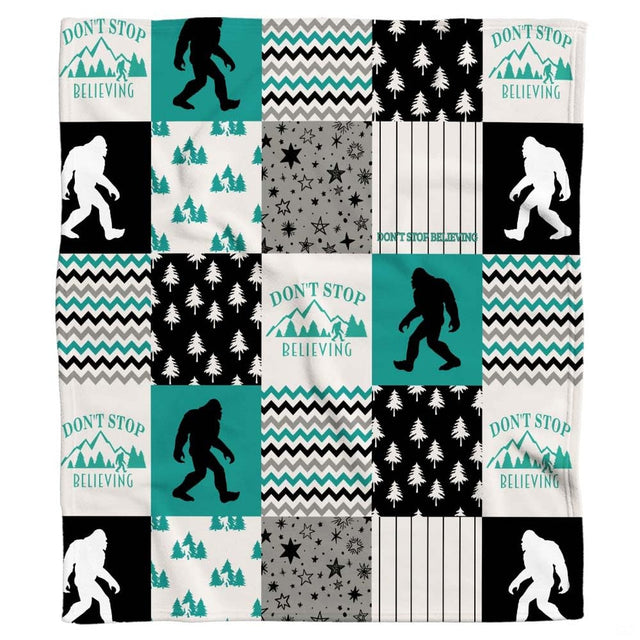 Bigfoot silhouette artwork with evergreen trees and teal chevron stripes for cryptid bedroom decor.