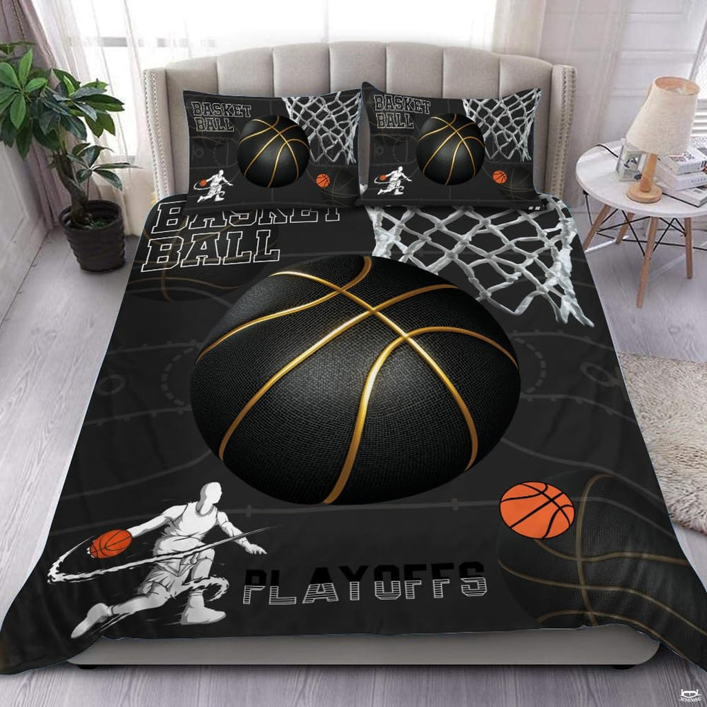 Boys basketball bedding featuring a textured gold-ribbed hoop graphic and player silhouettes on charcoal.
