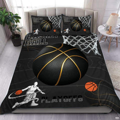 Boys basketball bedding featuring a textured gold-ribbed hoop graphic and player silhouettes on charcoal.