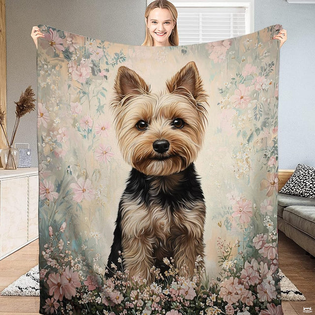 Yorkshire Terrier puppy portrait centered amid blush pink blossoms on floral dog bed cover bedding set.