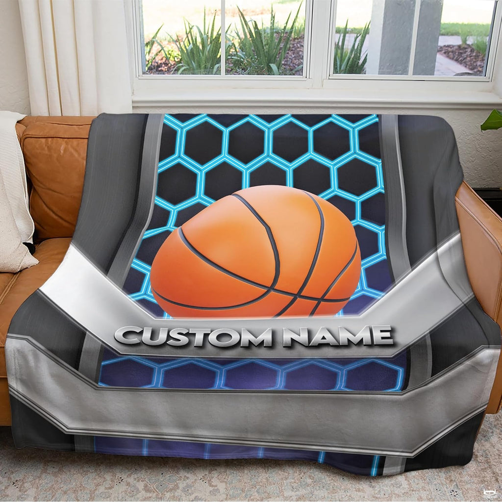 Folded cyber honeycomb basketball throw blanket resting on wooden table displaying metallic plates
