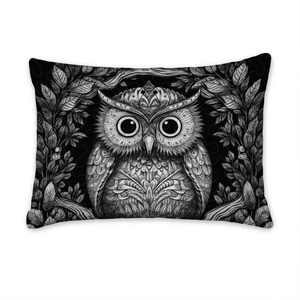 thematic accent bedroom display of the black and white owl motif centered in a modern dark decor setup.