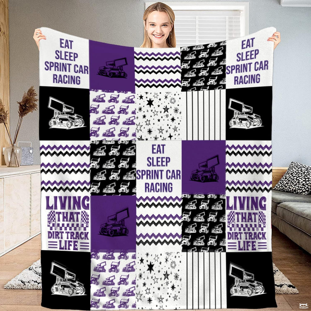Whimsigoth bedding set displaying thematic accent thematic accent race cars, checkered accents, and starry midnight sky...