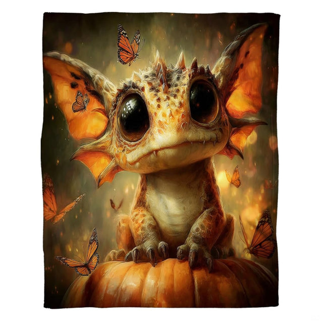 Adorable fantasy baby dragon throw blanket draped across living room sofa