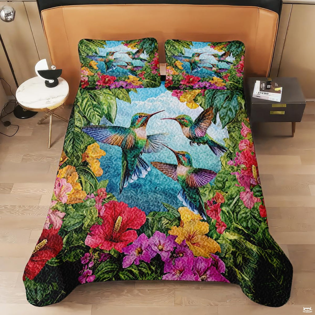 Hummingbird and hibiscus artwork shown on a modern bed