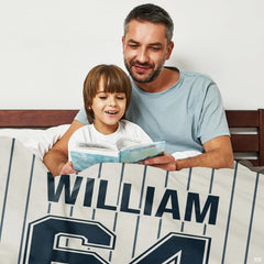 Detailed view of curved red baseball seam graphic artwork placed on the lower corner.