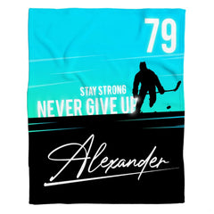 Close-up perspective of the bold athletic jersey numbering on crisp cyan bedding.