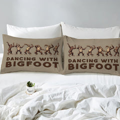 Overhead perspective of Bigfoot bedding arranged neatly across a rustic cabin bedroom mattress
