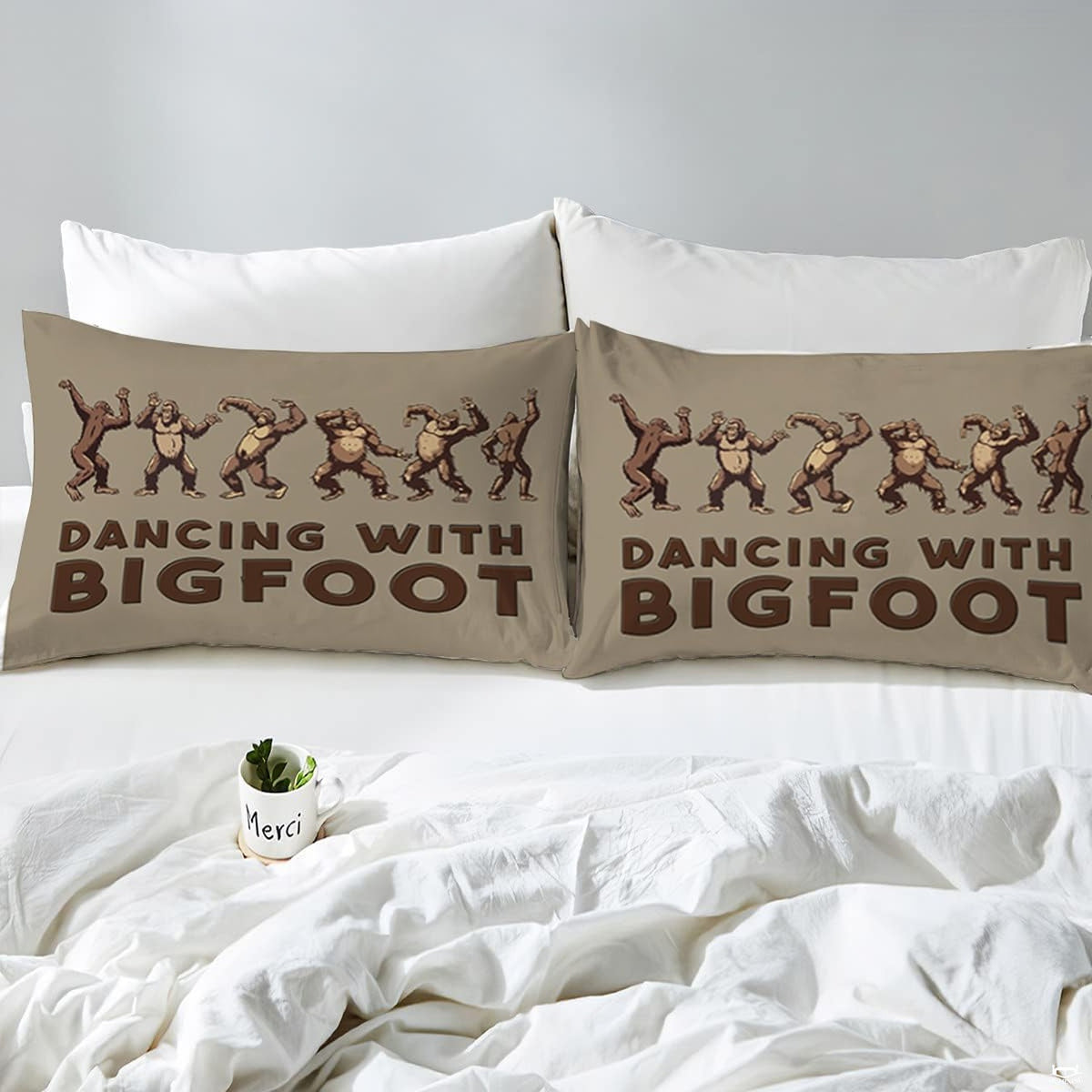 Overhead perspective of Bigfoot bedding arranged neatly across a rustic cabin bedroom mattress