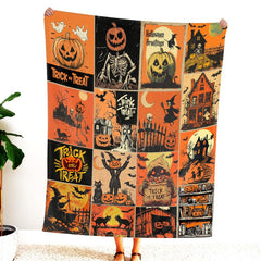 Folded view of the pumpkin comic blanket showing perimeter border hem and print clarity.