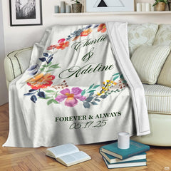 Close view of artistic floral artwork on wedding gift bed set displaying indigo leaves and thematic accent accents.
