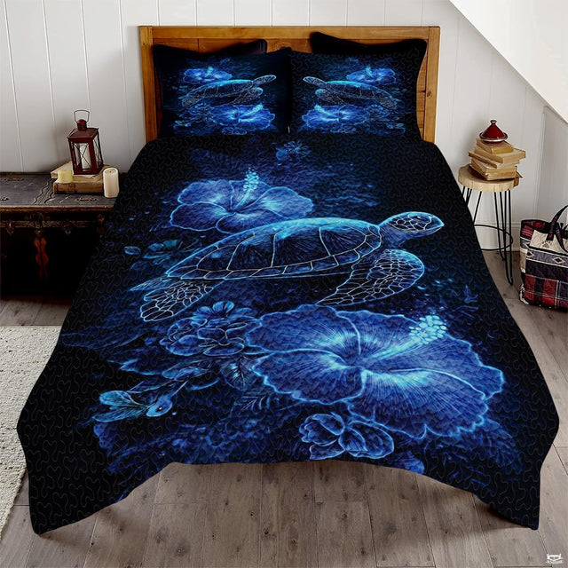 Bioluminescent sea turtle coastal blue bedding set displaying glowing neon hibiscus flora across deep indigo.